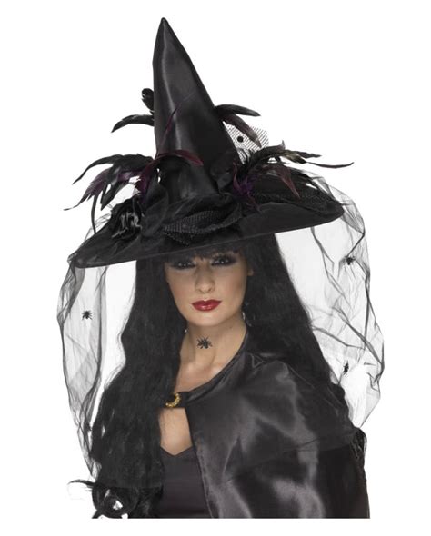 Black hat with witchy feathers